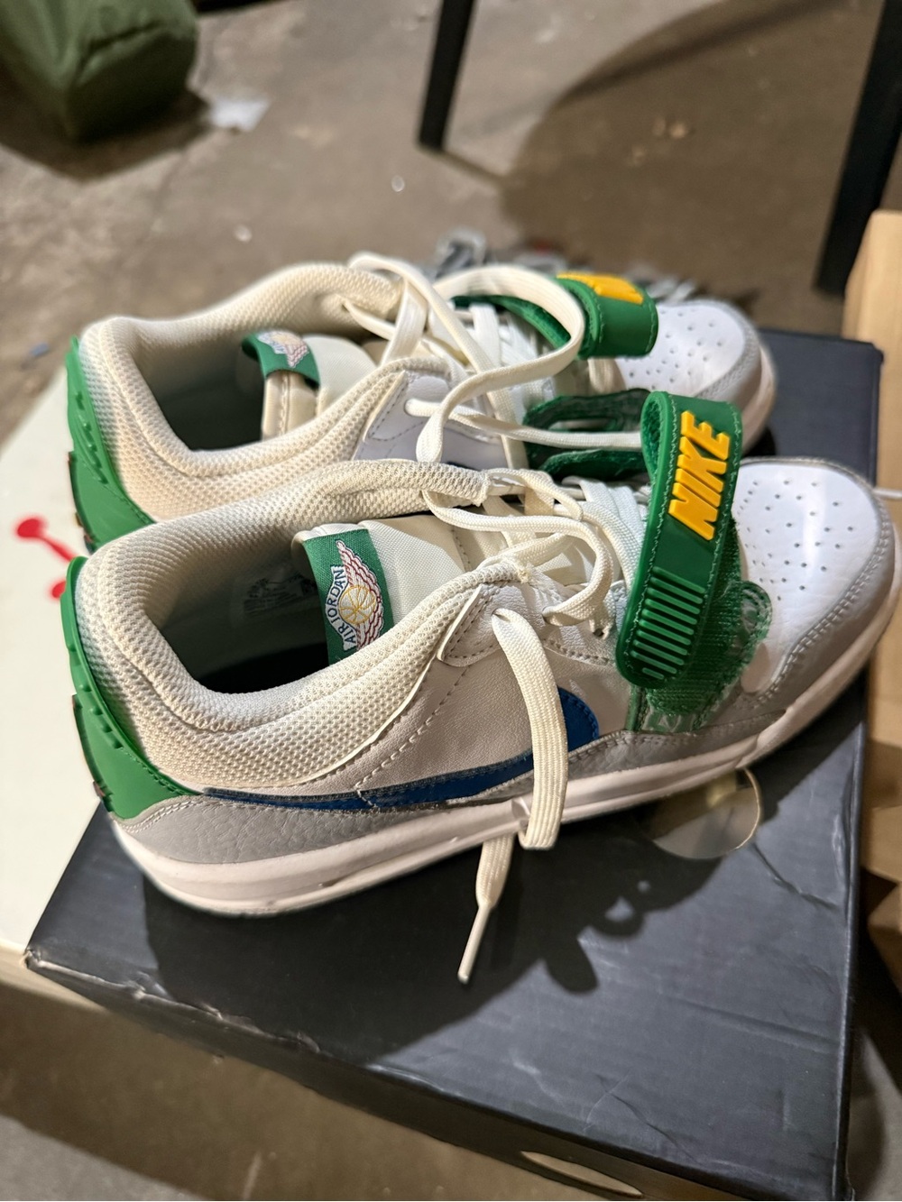 Nike Kids White Sneakers with Green and Blue Accents